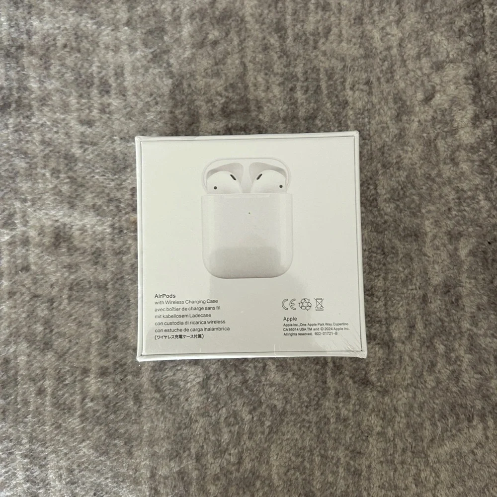 Apple AirPods with Charging Case in White